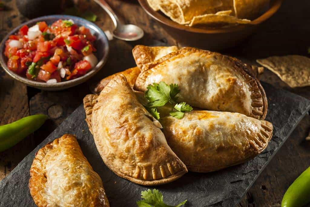These quick and easy beef empanadas, brimming with your favorite Mexican food ingredients, will be the perfect appetizer for any event. Load them up with your favorite El Sol Salsa!